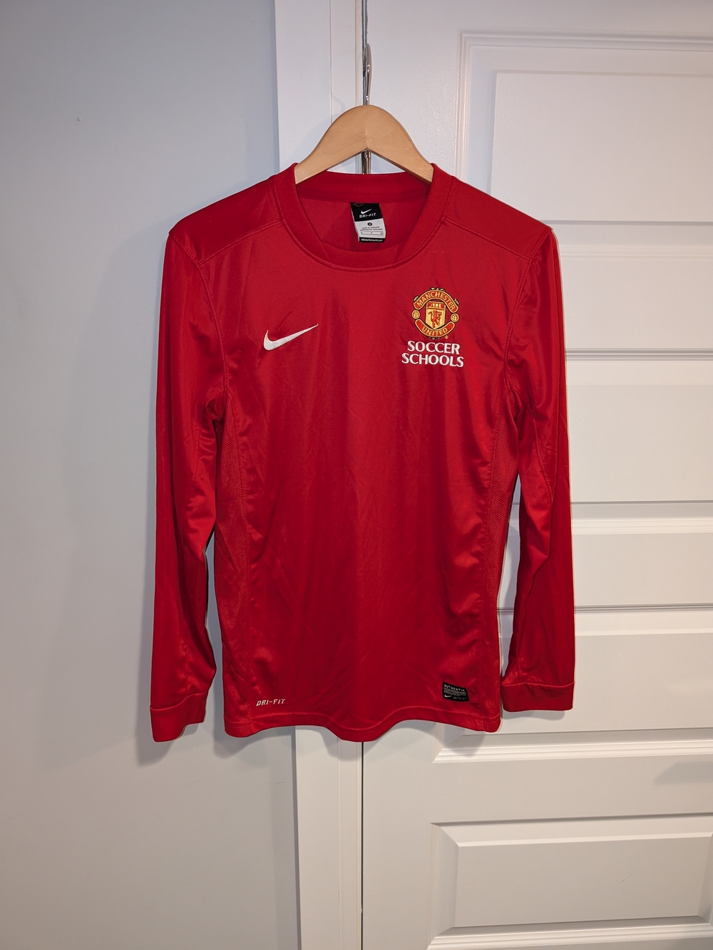 Nike Red Manchester United Kids Soccer Schools Long Sleeve Training Top